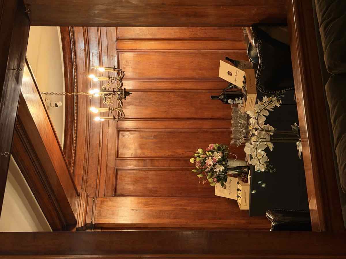 A wood-panelled room set for wine tasting