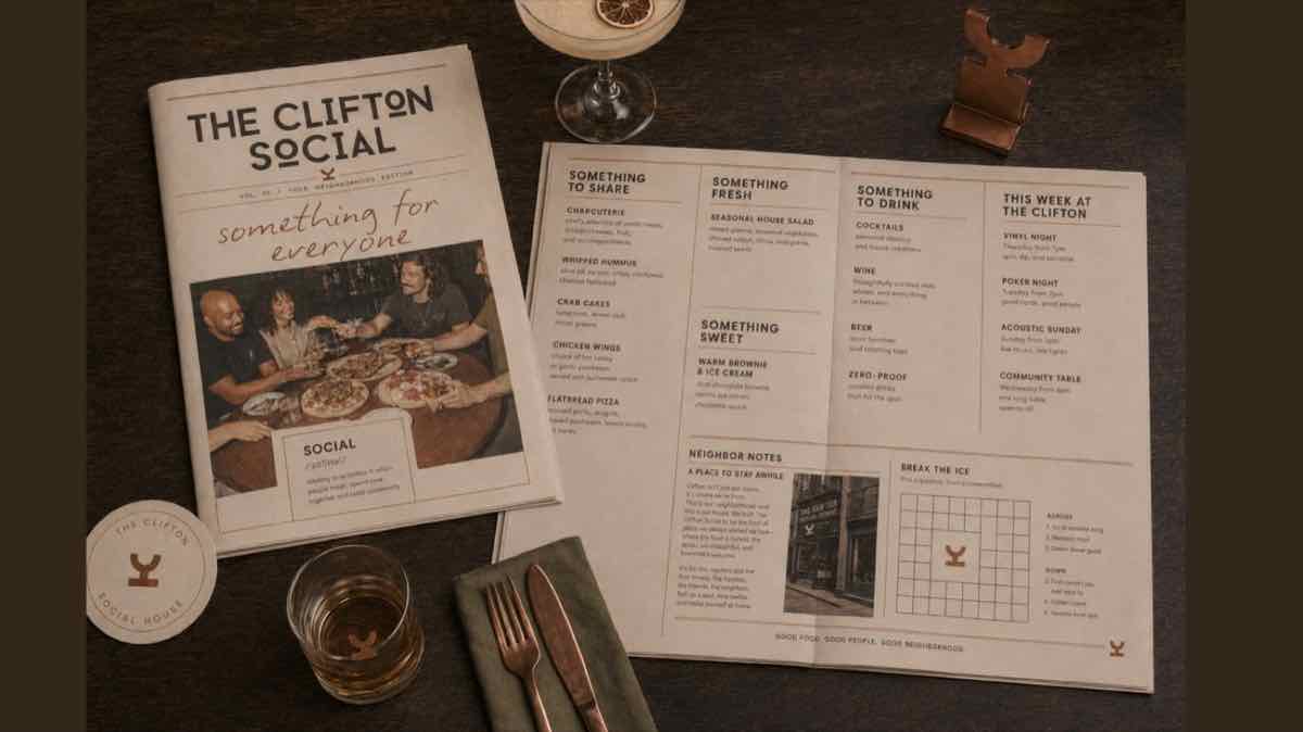 The Clifton Social menu and printed materials on a table
