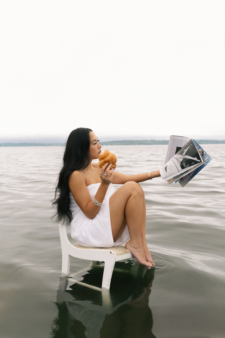 Final image: model on a chair in the lake